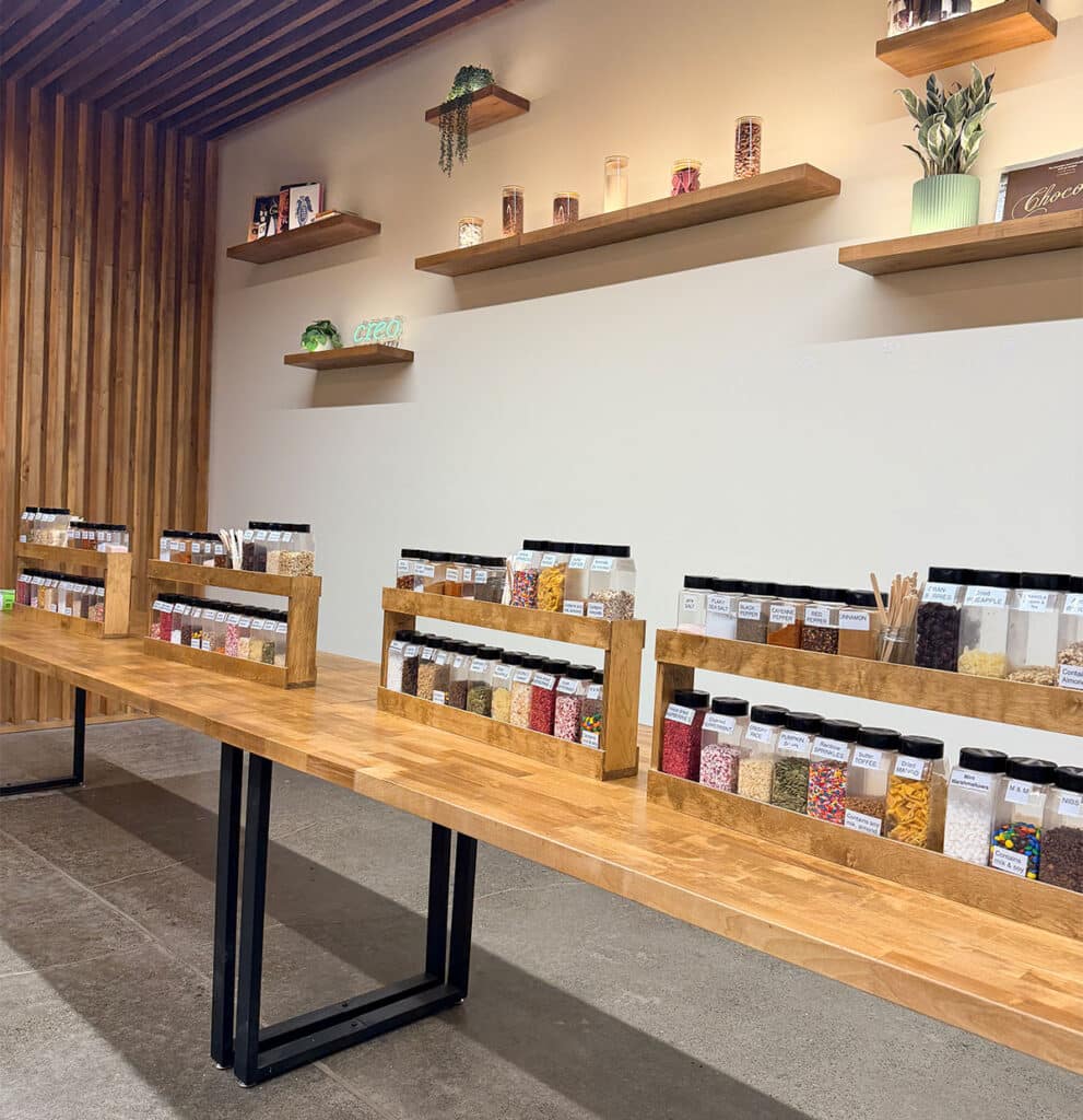 Creo Chocolate Lab, with a long table and bottles of ingredients for chocolate-making